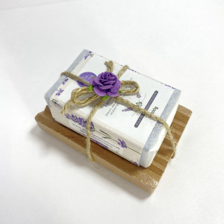 Lavender soap on wooden soap dish tied with string. Eco gift