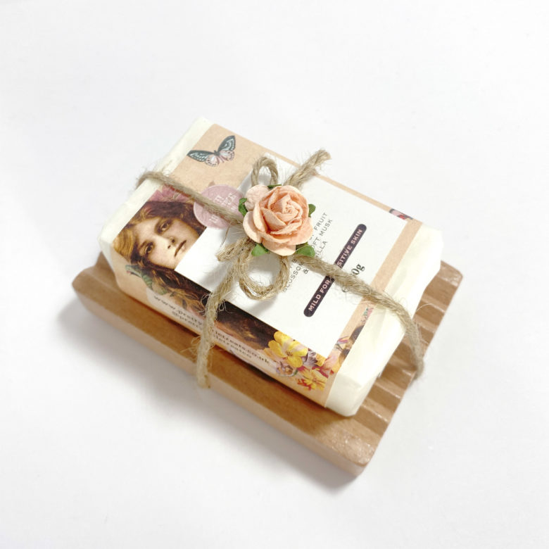 Soap on wooden soap dish tied with string. Eco gift